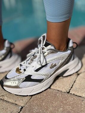 Lacoste White and Black Women's Athletic Sneakers with Metallic Detail